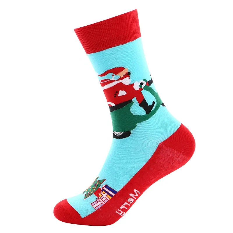 Sock Wollah – Kerstman op Scooter op lichtblauw Sock Wollah – Kerstman op Scooter op lichtblauw